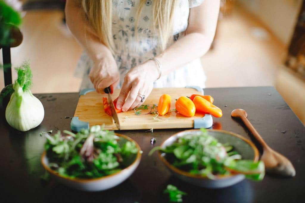 Cutting peppers for a salad
