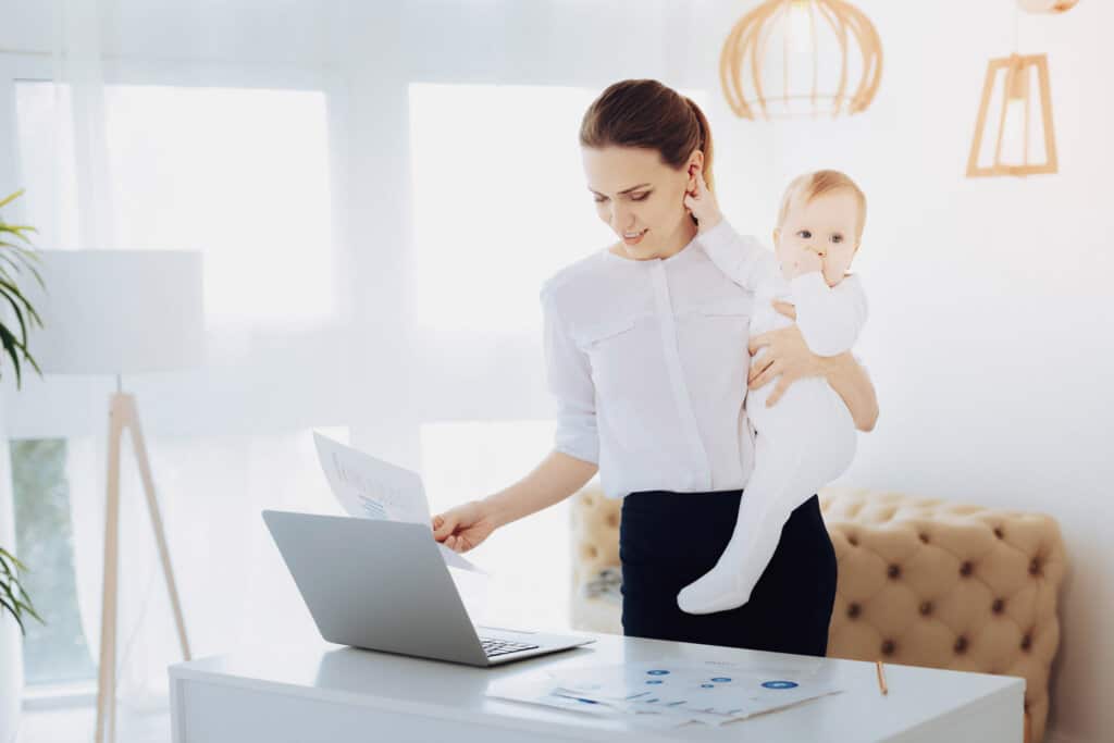 Working Mom holding Baby
